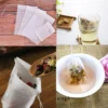 100pcs One-Time Non Woven Bags Disposable Filling Bags Accessories With Strings For Loose Oolong Green Tea Flower Spices Herbal
